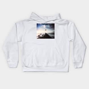 Balloon flying over the sea Kids Hoodie